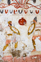 Paestum, ancient frescoes in the tomb of fighting warriors