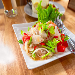 Spicy Thai salad with carrot, tomato, glass noodle, celery and shrimp