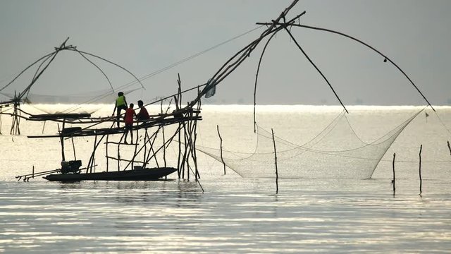 Yokyor is old style for fishing of Thai people in Pak Pra Village, sunrise time in Phatthalung, Thailand., Lockdown.