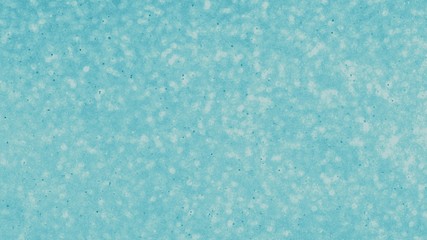 Fototapeta na wymiar Blue background. Shining sparkles underwater, beautiful abstract texture.