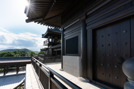 Day scene with sun ray of Guan Yin wooden Temple in Hong hong. (Tsz Shan Monastery)