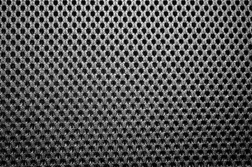 Closeup the mesh fabric pattern of the backrest of the chair 