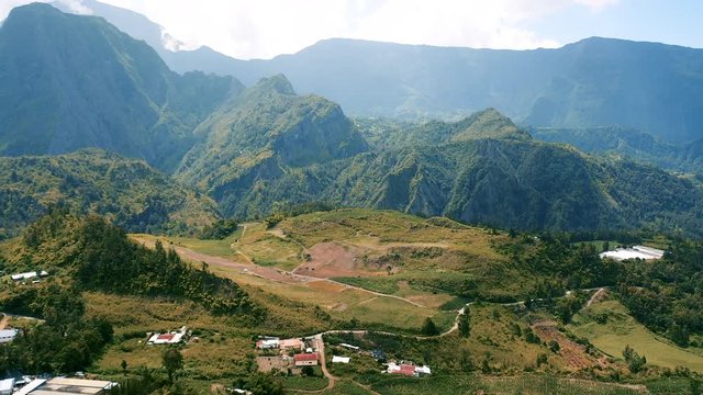 Aerial view over the dramatic mountain landscape surrounding the town of Hell-Bourg on Reunion Island