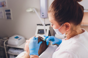Platelet rich plasma injection procedure. Hair growth stimulation. PRP therapy process.
