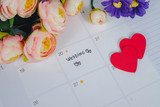 Word Wedding to Reminder Wedding day in calendar planning and pen with heart.