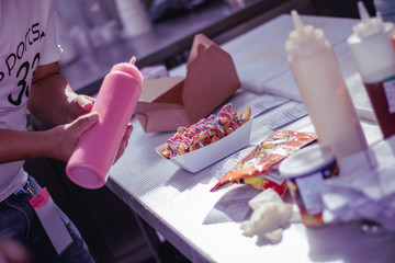 woman like a litte girl playing on the sun of dubai