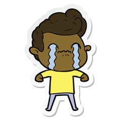 sticker of a cartoon man crying
