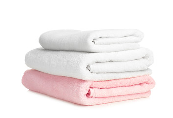 Folded soft terry towels on white background