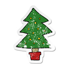 distressed sticker of a cartoon christmas tree