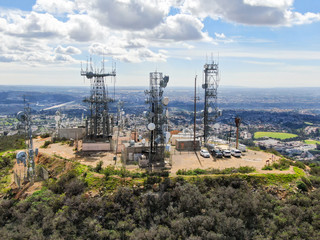 Aerial view of telecommunication antennas on the top of Black Mountain in Carmel Valley, SD, California, USA.  Television, radio and communications antenna with numerous transmitters, Technology.