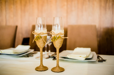 Two wedding glasses in the style of the rustic