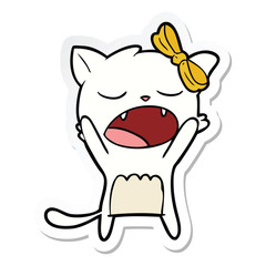 sticker of a cartoon cat meowing