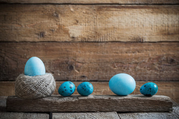 Easter eggs on old wooden background