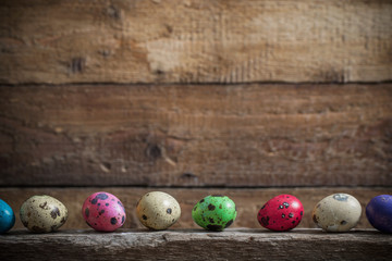 Easter eggs on old wooden background