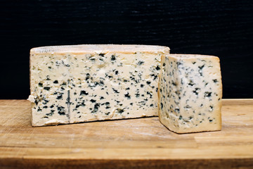Mild blue Auvergne cheese Fourme d' Ambert from France