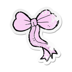 retro distressed sticker of a cartoon bow