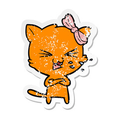 distressed sticker of a cartoon cat