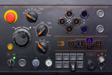 Fototapeta premium many kind switch and turns dial of control panel for adjust parameter cnc lath machine at factory