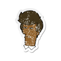 retro distressed sticker of a cartoon man narrowing eyes