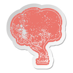 distressed old sticker of a summer tree