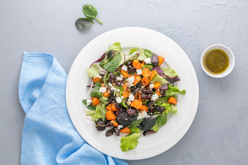 Baked beet and carrot salad with cheese. top view