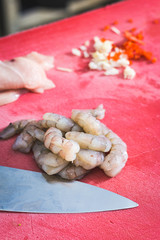 Food shot of raw shrimps in cooking process