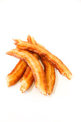 spanish fritters on white background
