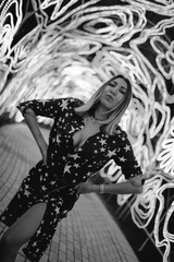 woman like a litte girl playing on the sun of dubai