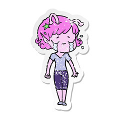 distressed sticker of a cartoon crying alien girl