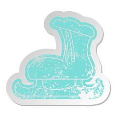 distressed old sticker of an ice skate boot