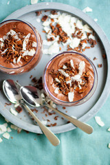Homemade vegan chocolate mousse with coconut creamand cocoa