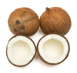 Coconuts whole and half isolated on white background. Tropical fruit. Flat lay, top view