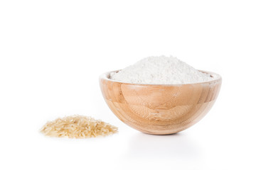 White rice flour in a bowl isolated on white background