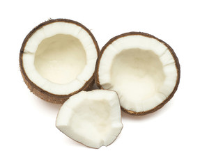 Coconuts two half and piece isolated on white background. Tropical fruit. Flat lay, top view