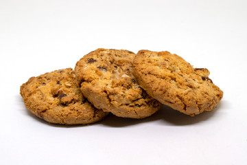 Cookies bakery photo closeup on white background. Bakery studio photo. Dry cookie with raisin closeup