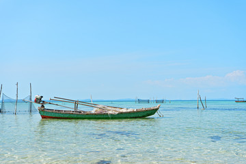 Fototapeta na wymiar Boat on Rach Vem beach in Phu Quoc, Vietnam