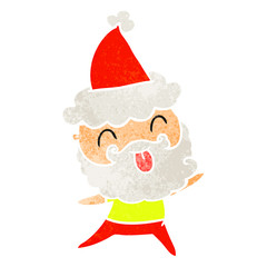 man with beard sticking out tongue wearing santa hat
