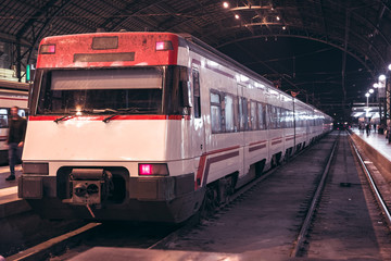 Locomotive at train station. Railway station.