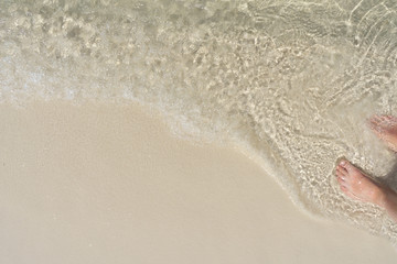 foot on the beach