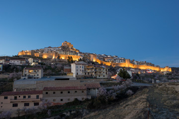 Fototapeta na wymiar The town of Morella illuminated at night