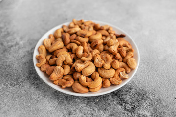 Cashew nuts close up. Breakfast, healthy food. It can be used as a background