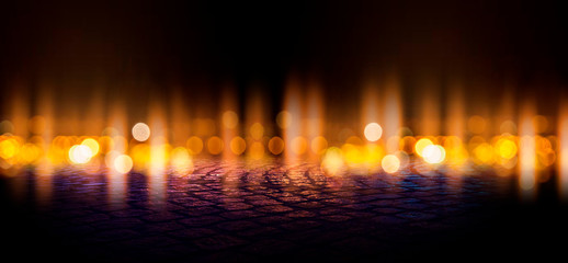 Wet asphalt, reflection of neon lights, a searchlight, smoke. Abstract street with smoke, smog. Night background, night city Abstract bokeh light, night bokeh.