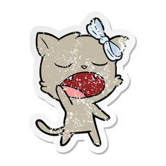 distressed sticker of a cartoon yawning cat