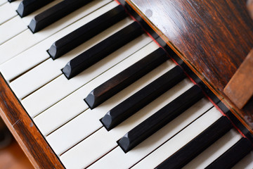 Piano keyboard of a classic wooden piano