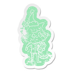 cartoon distressed sticker of a friendly fox manager wearing santa hat