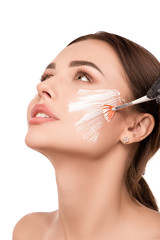 Fototapeta premium Facial treatments in cosmetology. Beauty portrait
