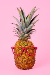 pineapple wearing red eyeglasses.
