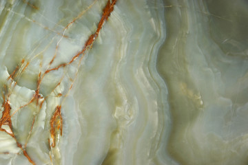 Green onyx with veins, the surface of natural stone - 254983758