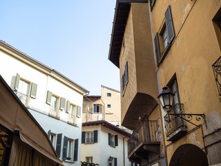Fototapeta na wymiar medieval urban houses in center of Brescia city