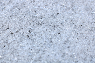 Snow background with detailed snowflakes. Macro photo of snow